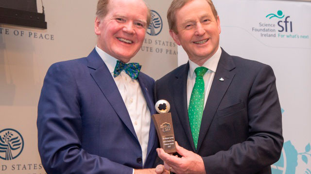 Taoiseach Enda Kenny (right) presents The Science Foundation Ireland St. Patrick&#39;s Day Science Medal 2017 to Dr. Pearse Lyons, president of Alltech, at the United States Institute of Peace. Photographed by Nick Crettier.
