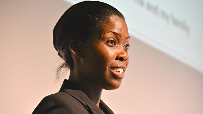 Emma Naluyima, a Ugandan veterinarian and one-acre pig and crop farmer, making a presentation at the Global Forum for Food and Agriculture (GFFA) (photo credit: ILRI/Susan MacMillan).