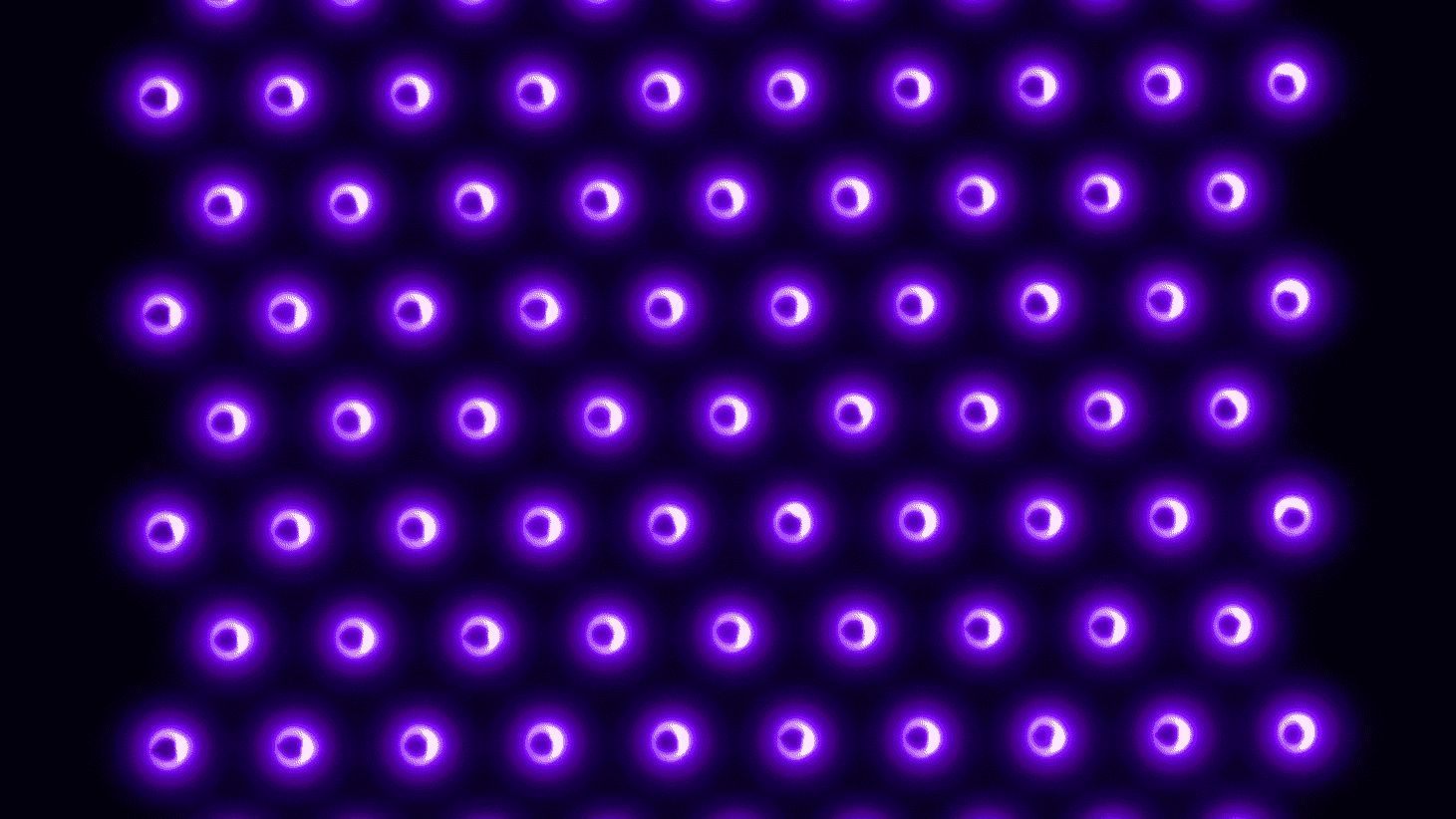 U of M researchers are testing the efficacy of various plasma sources, including a 2D integrated coaxial micro hollow dielectric barrier plasma discharge array. Plasma (purple) is produced inside the holes of the array, through which air is blown. This plasma source has been productively breaking down various viruses&mdash;the pathogens are inactivated when they come into contact with the air coming through the holes in the array.
