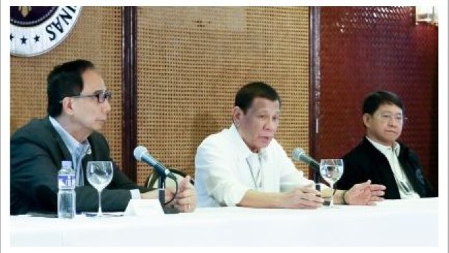 President Rodrigo Duterte with Agriculture Secretary William Dar, and Interior and Local Government Secretary Eduardo Año