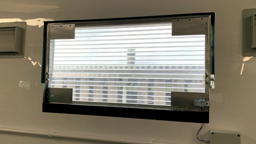 Under normal conditions the drop-out window panels serve as conventional windows.