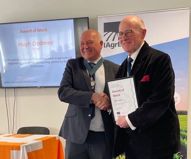 Hugh Crabtree (right) is presented with the Award of Merit by Steve Constable, president, Institution of Agricultural Engineers, at a special ceremony held at Amazone Ltd, Doncaster. (Photo: Marion King)