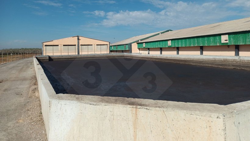 Digestate storage lagoon.
