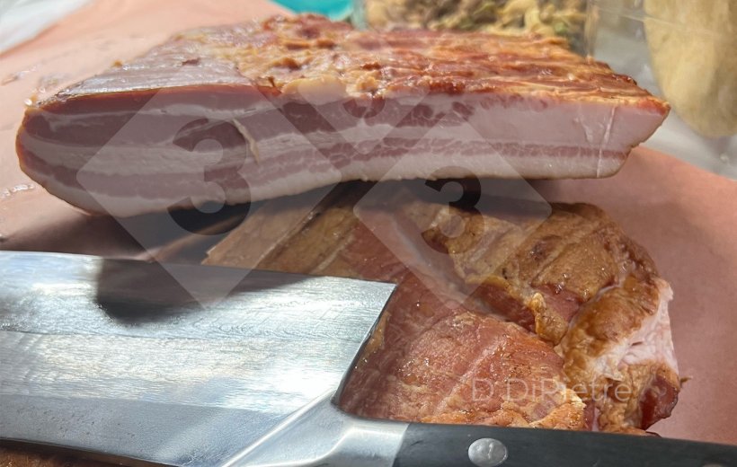 Figure 2. Author Dennis DiPietre makes his own bacon.