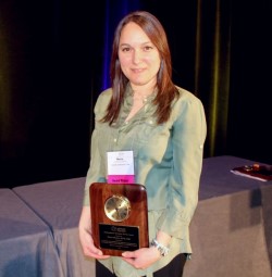 Maria Pieters receives the 2024 Distinguished Service Award. Photo credit: Ryan Tibbitts.