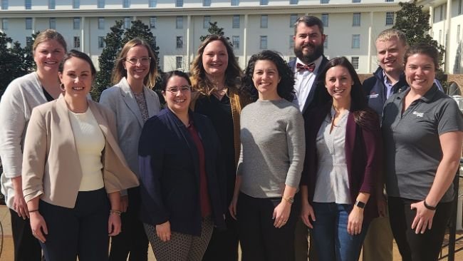 L-R Front: Erin Kettelkamp, Miranda Medrano, Katie Woodard, Kayla Henness, Katie O'Brien.
L-R Back: Emily Fry, Megan Kelly, Rachel Stika Jensen, Justin Brown, Evan Koep