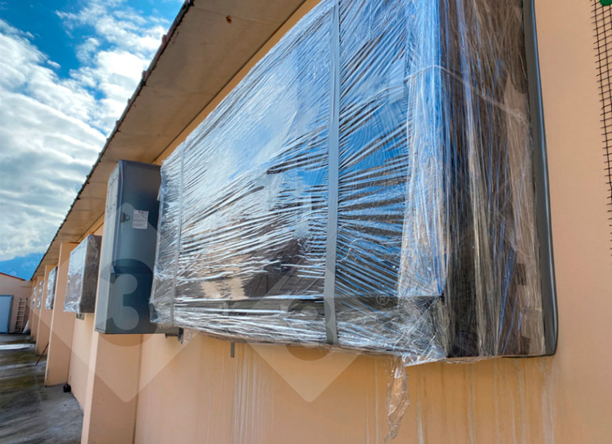 <p>Photo 3. All air inlets (cooling vents) adjacent to Building 2 were sealed with plastic..</p>
