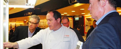 Timothy Broderick, executive chef at the Great Food Hall in Hong Kong, discusses meat selections with Joel Haggard (left), USMEF Senior VP for the Asia Pacific region, Nebraska Beef Council Member Chris Abbott (right) and Illinois Soybean Association board member Mark Sprague