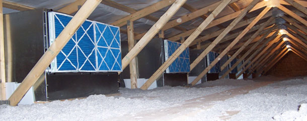 Image of the attic with filter boxes in a sows' farm adapted to the air filtering system.