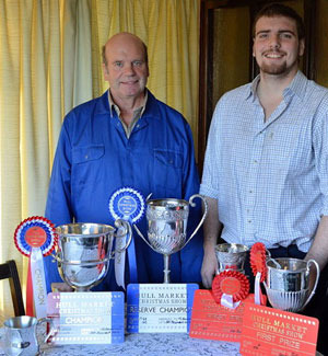 Ian Broumpton (left) with his son, Daniel, with the trophies they picked up at Hull Market Christmas Show and Sale.