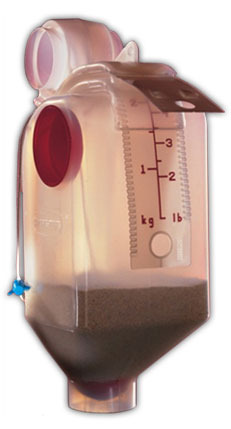 Feed dispenser with adjustment scale in kg and lb.