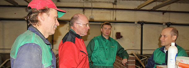 Hugh Crabtree  (2nd left) discusses the finer points of ventilation with producers on a Finnish pig farm.