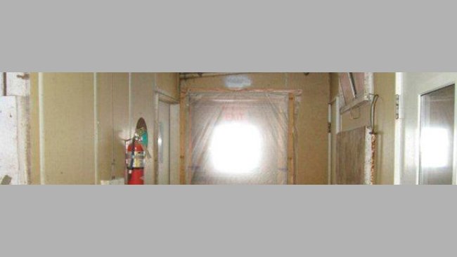 Example of sealed door system that prevent unwanted air transfer and the convenient yet inappropriate movement of personnel between the clean and the dirtyzones of the facility